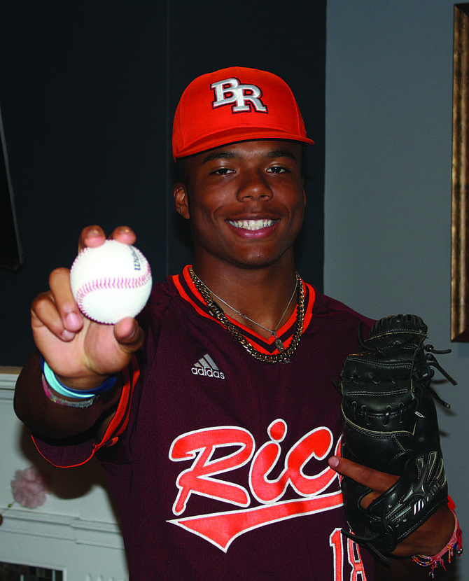 Zion Rose, a 15-year-old sophomore at Chicago’s Brother Rice High School, is one of the top ranked baseball players in the country, and when he is not playing ball, he is on his laptop dabbling in online trading. He plans to become an engineer or a stock broker, if baseball does not work out for him professionally. Photo credit: By Wendell Hutson