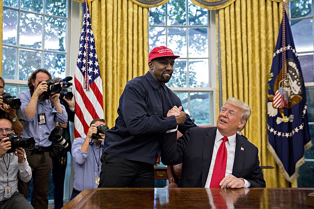 Rapper Kanye West, left, shakes hands with U.S. President Donald Trump during a meeting in the Oval Office of the White House in Washington, D.C., U.S., on Thursday, Oct. 11, 2018. West, a recording artist and prominent Trump supporter, is at the White House to have lunch with the president and to meet with presidential son-in-law and senior adviser Jared Kushner who has spearheaded the administrations efforts overhaul the criminal justice system. Photographer: Andrew Harrer/Bloomberg via Getty Images
Credit:	Bloomberg/Bloomberg/Bloomberg via Getty Images