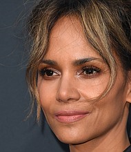 After facing backlash on social media, actress Halle Berry announced on Twitter she is no longer considering portraying a transgender man in an upcoming film role./Credit:	Robyn Beck/AFP/Getty Images