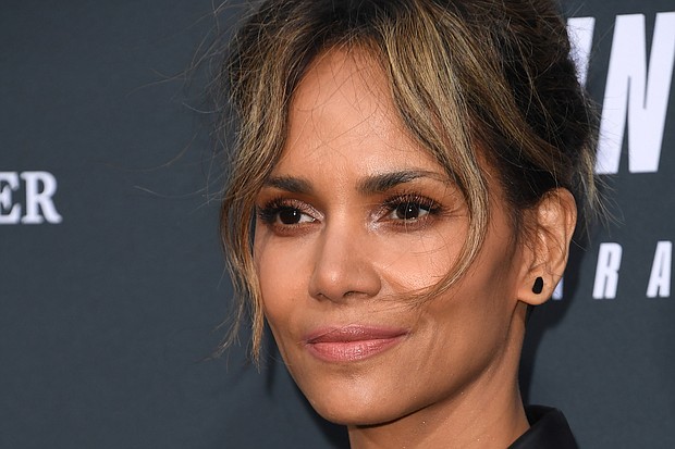 After facing backlash on social media, actress Halle Berry announced on Twitter she is no longer considering portraying a transgender man in an upcoming film role./Credit:	Robyn Beck/AFP/Getty Images