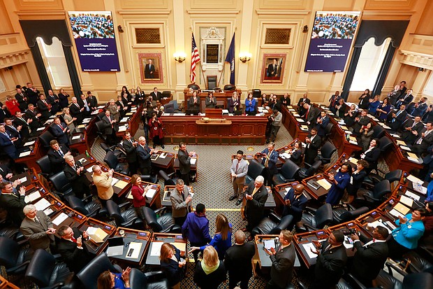 Virginia House of Delegates, Speaker Eileen Filler-Corn, D-Fairfax, center, is escorted to the rostrum during opening ceremonies of the 2020 Virginia General Assembly at the Capitol in Richmond, Virginia, in January 2020. Filler-Corn is the first woman to hold the position./Credit: Steve Helber/AP