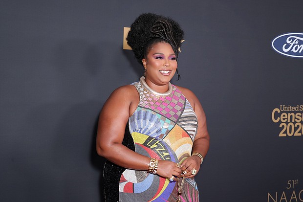 Lizzo was just trying to have some fun in the sun with her girls when one property manager, apparently, decided to try and throw some shade./Credit:	Leon Bennett/Getty Images