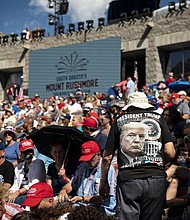 Hundreds of people arrived at Mount Rushmore to watch President Donald Trump ahead of Fourth of July./Credit:	Al Drago/Bloomberg/Getty Images
