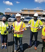 School Board Chairwoman Linda Owen, from left, Schools Superintendent Jason Kamras, Mayor Levar M. Stoney and School Board Vice Chairwoman Cheryl Burke speak to the media after touring the new $64.5 million, 1,500-student capacity River City Middle School on Hull Street Road in South Side on July 2.