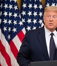 President Donald Trump will visit Walter Reed on Saturday July, 11, to visit wounded service members, multiple sources told CNN and the White House later confirmed./Credit:	SAUL LOEB/AFP/Getty Images