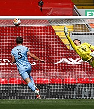 Nick Pope is beaten by Andy Robertson's header, but the Burnley keeper's performance was key to the Clarets taking a point away from Anfield./Credit:	Clive Brunskill/Getty Images Europe/Getty Images