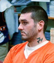 A federal judge on Monday blocked the planned execution of convicted killer Daniel Lewis Lee, and three others, citing ongoing challenges to the federal government's lethal injection protocol./Credit:	Dan Pierce/AP