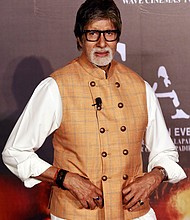 Bollywood star Amitabh Bachchan poses during the launch of "Sarkar 3" in Mumbai in March 2017. Bachchan has been hospitalized after testing positive for coronavirus, according to his official Twitter account./Credit:	Rafiq Maqbool/AP