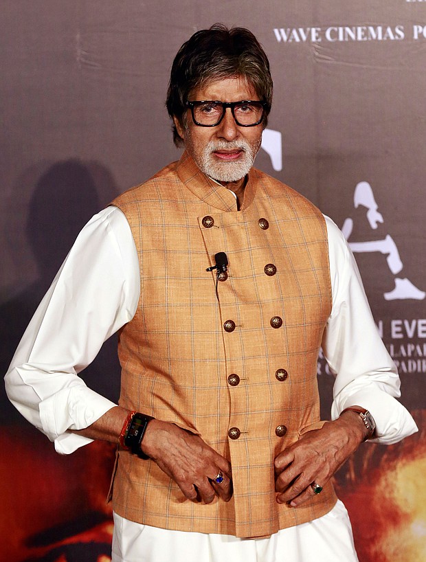 Bollywood star Amitabh Bachchan poses during the launch of "Sarkar 3" in Mumbai in March 2017. Bachchan has been hospitalized after testing positive for coronavirus, according to his official Twitter account./Credit:	Rafiq Maqbool/AP