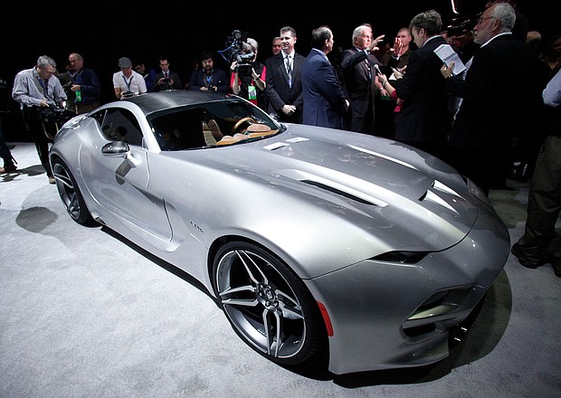 The Fisker Force 1 sports car is revealed to the news media at the 2016 North American International Auto Show January 12th, 2016 in Detroit, Michigan. The body of the Force 1 is all carbon fiber, and the limited-edition vehicle will be priced just under $300,000. The NAIAS runs from January 11th to January 24th and will feature over 750 vehicles and interactive displays./ Credit:	Bill Pugliano/Getty Images