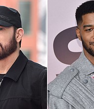 Kid Cudi and Eminem released their first collaboration on Friday titled "The Adventures of Moon Man & Slim Shady." The song touches on a number of topics, from people refusing to wear masks to police brutality./Credit:	Getty
