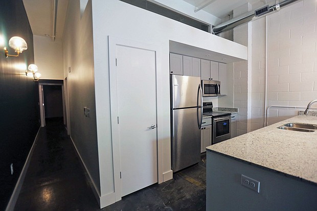 A view of a kitchen at CARITAS’ new emergency shelter for women. The complex also will contain the nonprofit’s furniture bank that helps about 800 low-income families annually furnish their homes.