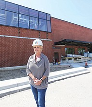 Karen J. Stanley, president and chief executive officer of CARITAS, shows off the exterior of the new $27 million, 150,000-square-foot complex at 2200 Stockton St. in South Side that will be dedicated largely to helping women overcome addiction. The center includes space for a 120-bed treatment program and a 28-bed emergency shelter for women.