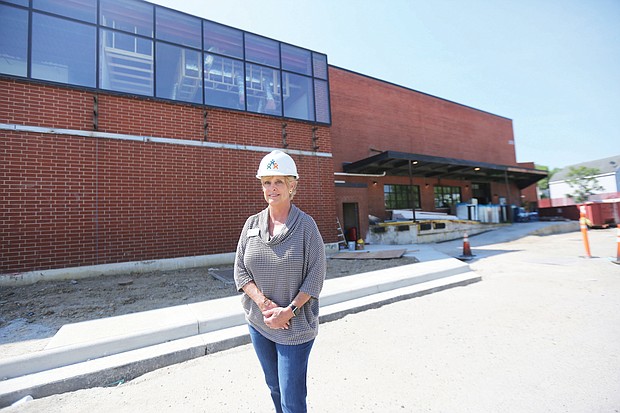 Karen J. Stanley, president and chief executive officer of CARITAS, shows off the exterior of the new $27 million, 150,000-square-foot complex at 2200 Stockton St. in South Side that will be dedicated largely to helping women overcome addiction. The center includes space for a 120-bed treatment program and a 28-bed emergency shelter for women.