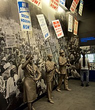 Statues of African Americans marching and yielding protest signs inside the National Civil Rights Museum at the Lorraine Motel in Memphis Tennessee. (Dreamstime/TNS)