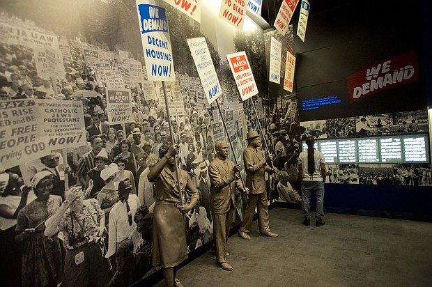 Statues of African Americans marching and yielding protest signs inside the National Civil Rights Museum at the Lorraine Motel in Memphis Tennessee. (Dreamstime/TNS)