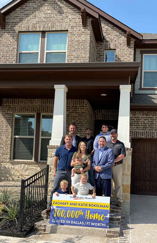The David Weekley Homes team celebrated the Bokelmans being the company’s 100,000th closing.
