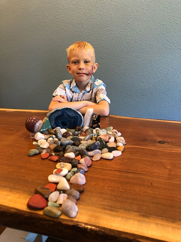 Bridger Walker, 6, saved his sister from a dog attack, he was praised by Anne Hathaway on social media for his deed./Credit: Courtesy Robert J. Walker