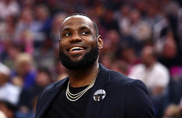 A rare LeBron James trading card sold for a record-breaking $1.845 million at auction over the weekend, the NBA said.
