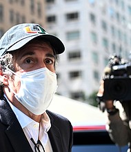 Michael Cohen, President Donald Trumps former personal attorney, sues Attorney General William Barr for retaliation in latest attempt to get out of prison. The image shows Cohen arriving at his Park Avenue apartment on May 21, 2020, in New York City./Credit:	JOHANNES EISELE/AFP/AFP via Getty Images