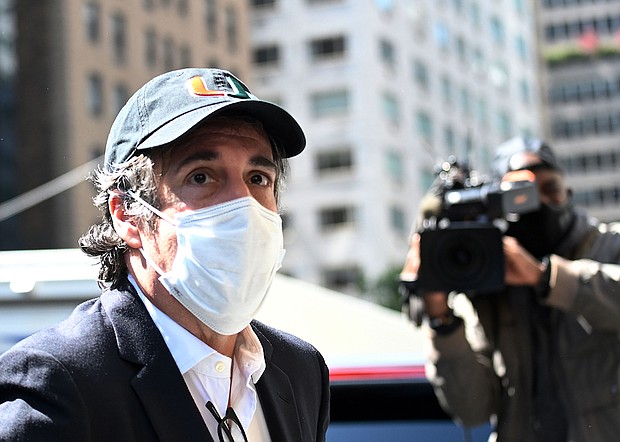 Michael Cohen, President Donald Trumps former personal attorney, sues Attorney General William Barr for retaliation in latest attempt to get out of prison. The image shows Cohen arriving at his Park Avenue apartment on May 21, 2020, in New York City./Credit: JOHANNES EISELE/AFP/AFP via Getty Images