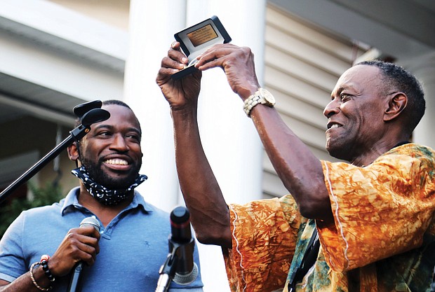 Mayor Levar M. Stoney presented him with a proclamation and a key to the city.