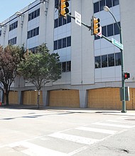 The barriers were removed last weekend, enabling westbound traffic to move past the building again. police several nights, resulting in officers firing tear gas and rubber bullets into the crowds. The concrete bar- riers were installed after the tires were slashed on dump trucks that initially were used as barriers and the front door to the headquarters building was damaged. New Police Chief Gerald M. Smith authorized the barriers to be removed after the front door was fixed and most of the trucks were removed. Before the installation, the department put high priority on protecting the building after a Minneapolis police building was torched following the police killing of George Floyd on May 25 in Minnesota. Also prompting the barriers was a rumor that protesters would attempt to ram the building with a tractor-trailer. No attempt was made.