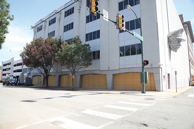 The barriers were removed last weekend, enabling westbound traffic to move past the building again. police several nights, resulting in officers firing tear gas and rubber bullets into the crowds. The concrete bar- riers were installed after the tires were slashed on dump trucks that initially were used as barriers and the front door to the headquarters building was damaged. New Police Chief Gerald M. Smith authorized the barriers to be removed after the front door was fixed and most of the trucks were removed. Before the installation, the department put high priority on protecting the building after a Minneapolis police building was torched following the police killing of George Floyd on May 25 in Minnesota. Also prompting the barriers was a rumor that protesters would attempt to ram the building with a tractor-trailer. No attempt was made.