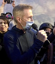 Mayor Ted Wheeler was tear gassed in downtown Portland early Thursday morning, according to video and posts on Twitter from a New York Times journalist. The image shows Wheeler speaking to people gathered in downtown Portland, Ore., Wednesday, July 22, 2020.