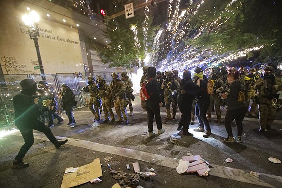 The complaint argues that while federal law allows federal officials to protect federal property, the heavily militarized agents who have ... The complaint argues that while federal law allows federal officials to protect federal property, the heavily militarized agents who have ...