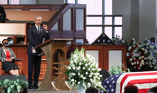Former President Barack Obama speaks during the funeral for Rep. John Lewis, D-Ga., at Ebenezer Baptist Church in Atlanta, Thursday, July 30./Credit:	Alyssa Pointer/Atlanta Journal-Constitution via AP