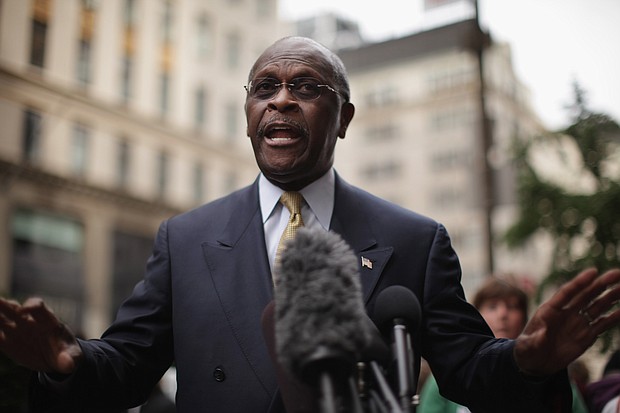 Herman Cain is pictured outside Trump Tower on October 3, 2011, in New York City. The former Republican presidential candidate has died from coronavirus./Credit:	Spencer Platt/Getty Images