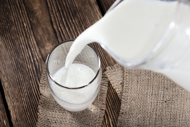 Whatever the reason, more and more Americans appear to be turning to cow's milk during the pandemic./Credit: Handmade Pictures/Shutterstock