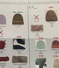& Other Stories uploaded this image of a purple hat with an offensive caption to a product overview system./Credit:	Obtained by CNN