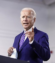 Democratic presidential candidate former Vice President Joe Biden speaks at a campaign event at the William "Hicks" Anderson Community Center in Wilmington, Delaware, on July 28, 2020./Credit:	Andrew Harnik/AP