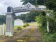 The entrance to Sir Moses Montefiore Cemetery, a Jewish cemetery started by immigrants in 1886 in Fulton, also bears graffiti linked to hate groups.