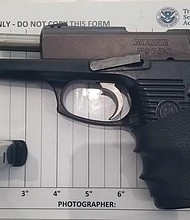 A handgun found by the Transportation Security Administration in carry-on baggage at Baltimore/Washington International Airport./Credit:	TSA