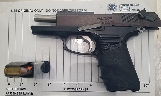 A handgun found by the Transportation Security Administration in carry-on baggage at Baltimore/Washington International Airport./Credit:	TSA