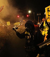 For weeks since Floyd's killing, protesters have taken to Portland streets./Credit:	Spencer Platt/Getty Images
