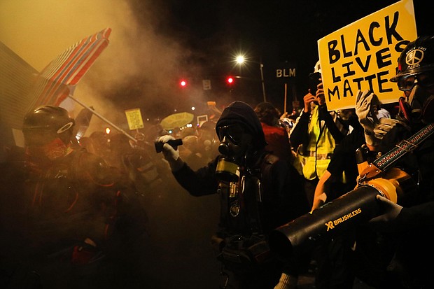 For weeks since Floyd's killing, protesters have taken to Portland streets./Credit:	Spencer Platt/Getty Images