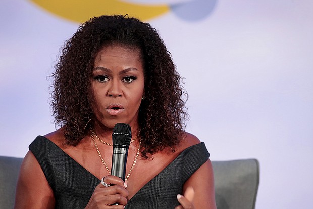 Michelle Obama recently revealed that because of the pandemic and racial injustice in the US, she has been experiencing low-grade depression. The former First Lady is pictured here speaking to guests at the Obama Foundation Summit in Chicago on October 29, 2019./Credit:	Scott Olson/Getty Images