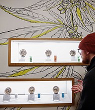 A customer shops for a recreational marijuana at Dispensary 33 store on January 1, 2020, in Chicago, Illinois./Credit:	Kamil Krzaczynski/AFP/Getty Images