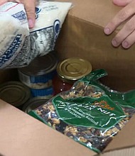 The boxes include canned and dried goods, and even a few recipes./Credit:	CNN