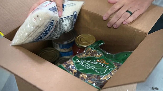 The boxes include canned and dried goods, and even a few recipes./Credit:	CNN