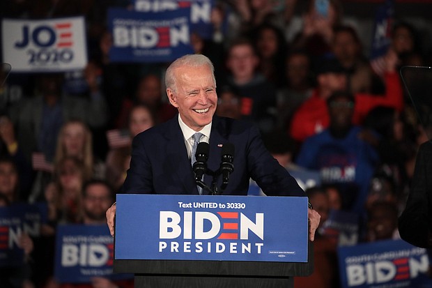 Democratic presidential candidate former Vice President Joe Biden celebrates with his supporters after declaring victory at an election-night rally at the University of South Carolina Volleyball Center on February 29, 2020 in Columbia, South Carolina./Credit:	Scott Olson/Getty Images