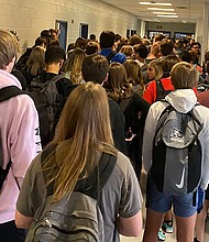 In this photo posted on Twitter, students crowd a hallway, Tuesday, Aug. 4, 2020, at North Paulding High School in Dallas, Ga.  The Georgia high school student says she has been suspended for five days because of photos of crowded conditions that she provided to The Associated Press and other news organizations. Hannah Watters, a 15-year-old sophomore at North Paulding High School, says she and her family view the suspension as overly harsh and are appealing it./Credit:	Hannah Watters via AP