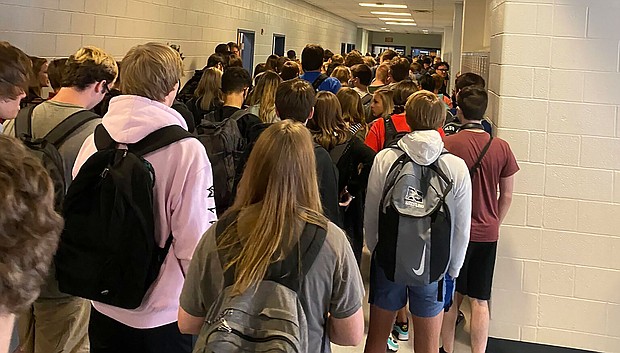 In this photo posted on Twitter, students crowd a hallway, Tuesday, Aug. 4, 2020, at North Paulding High School in Dallas, Ga.  The Georgia high school student says she has been suspended for five days because of photos of crowded conditions that she provided to The Associated Press and other news organizations. Hannah Watters, a 15-year-old sophomore at North Paulding High School, says she and her family view the suspension as overly harsh and are appealing it./Credit:	Hannah Watters via AP