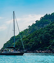 A sailing yacht at sea in Redang Island, Malaysia, in 2019./Credit:	Shutterstock