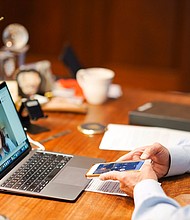 Biden video conferences with Harris over Zoom from his home in Delaware./Credit:	Adam Schultz/Biden for President