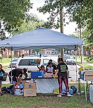 Other volunteers staff a tent and welcome visitors to pick up supplies, including free books. The 381 Movement, a group that grew from protests following the police killing of George Floyd in Minneapolis in late May, is named for the successful 381-day Montgomery, Ala., bus boycott in 1955-56 against racially segregated seating that propelled Rosa Parks and Dr. Martin Luther King Jr. to national attention. The modern movement’s goal is to offer solutions to racial and social injustice based on research, learning, legislation and volunteer initiatives that “empower, educate and evolve the community.”